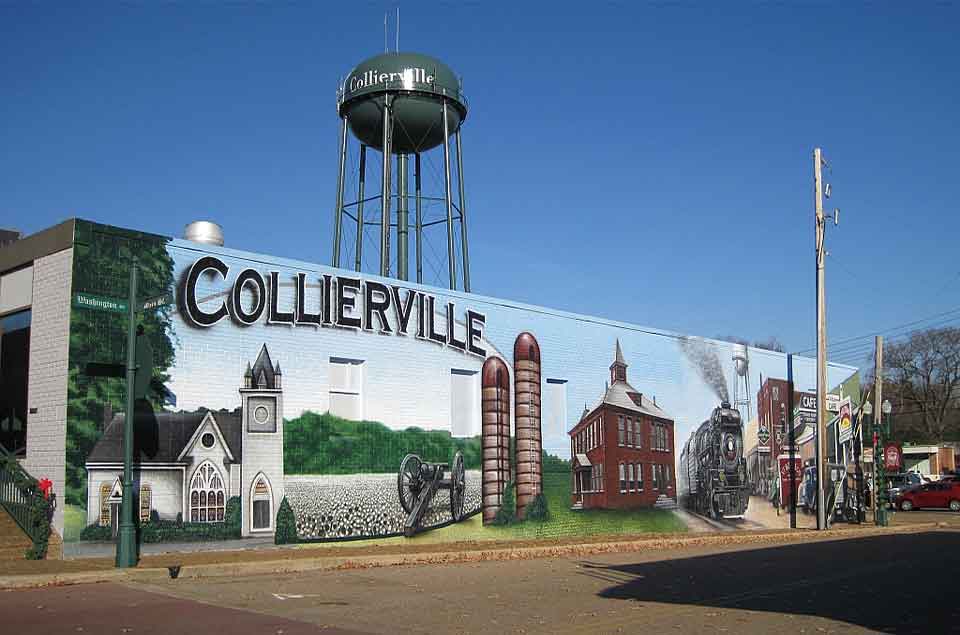 Collierville, TN wall mural sits below a water tower