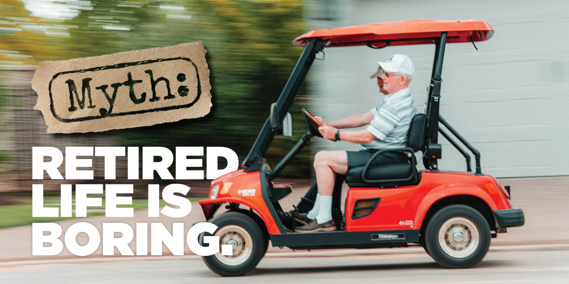 Man riding a golf cart