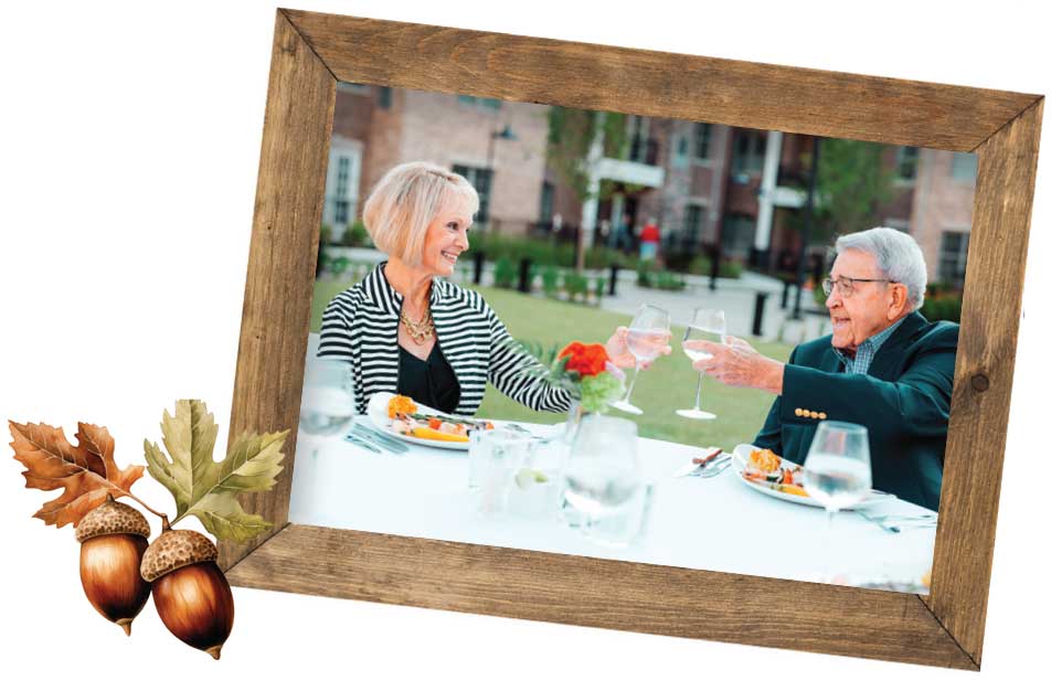 photo of two people toasting in a picture frame